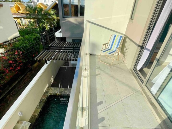 La Peregrina private balcony with pool view — Flic en Flac Mauritius