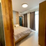 La Peregrina master bedroom with king bed and en-suite — Flic en Flac Mauritius